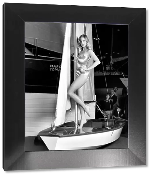 Top glamour model Stephanie McLean posing on a sailboat January 1975