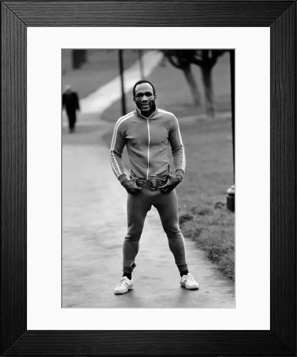 Framed Print : New British Heavyweight Champion Bunny Johnson showing off his belt Framed Print : New British Heavyweight Champion Bunny Johnson showing off his belt