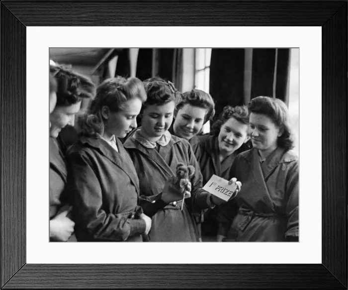 Framed Print : World War II Home front: 14 year old Eileen Gearing shows some admiring rivals her 1st Framed Print : World War II Home front: 14 year old Eileen Gearing shows some admiring rivals her 1st
