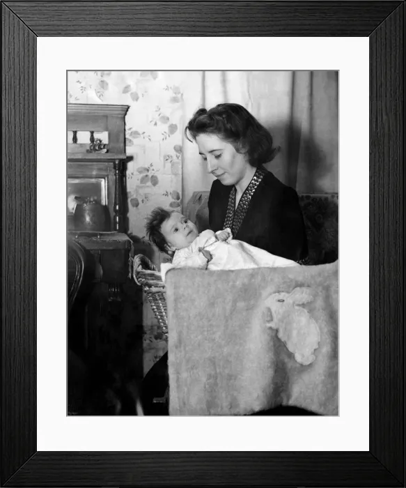 Framed Print : World War II Women: Domestic. Mother and child. December 1944 P010077