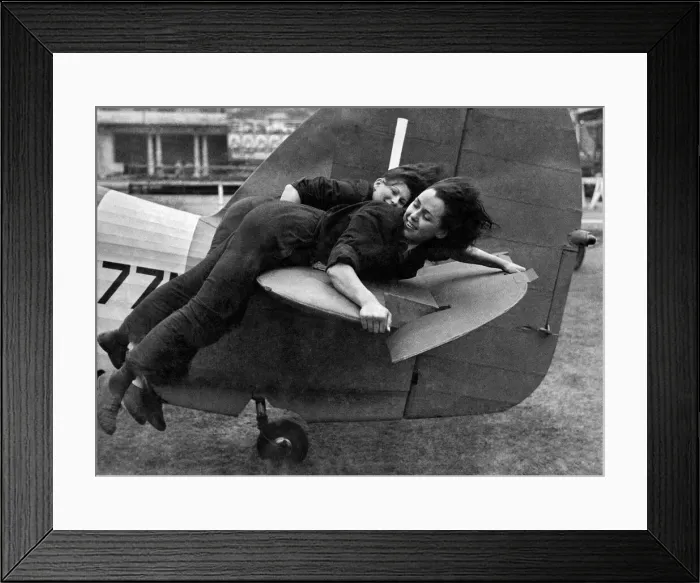 Framed Print : World War II: Women. WaF girl mechanics lying on the tail of a Hurricane fighter Framed Print : World War II: Women. WaF girl mechanics lying on the tail of a Hurricane fighter