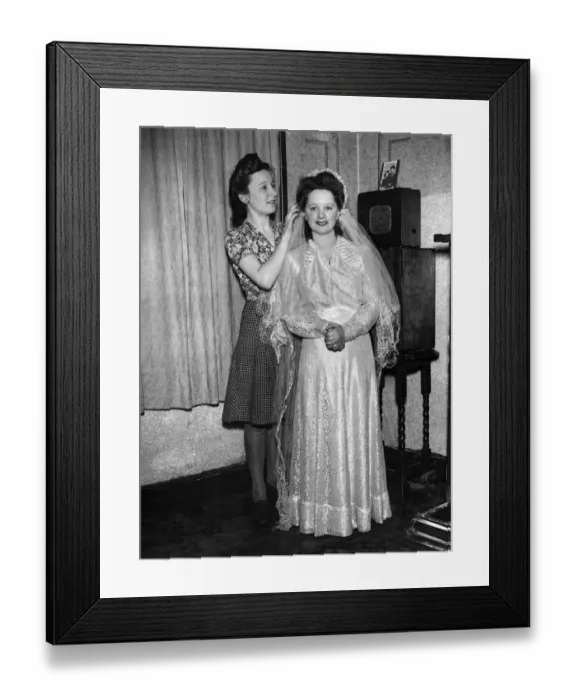 Framed Print : Warld War II: Romance: Wedding. The bride getting ready for her big day. P010085