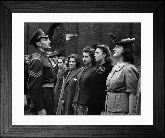 Framed Print : World War II Women. Sergeant S. Shorter illustrates how to stand at attention Framed Print : World War II Women. Sergeant S. Shorter illustrates how to stand at attention