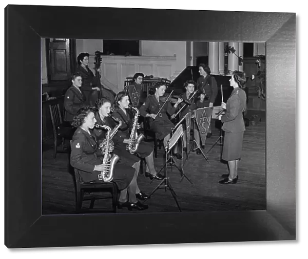 World War II Women: The A. T. S. Dance band with their conductor Junior Commander Angela
