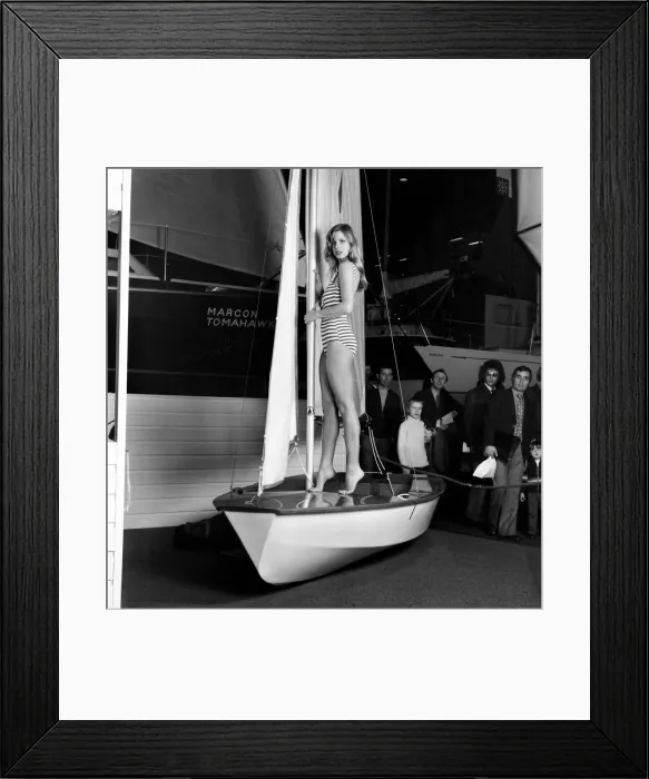 Framed Print : Top glamour model Stephanie McLean posing on a sailboat January 1975 Framed Print : Top glamour model Stephanie McLean posing on a sailboat January 1975