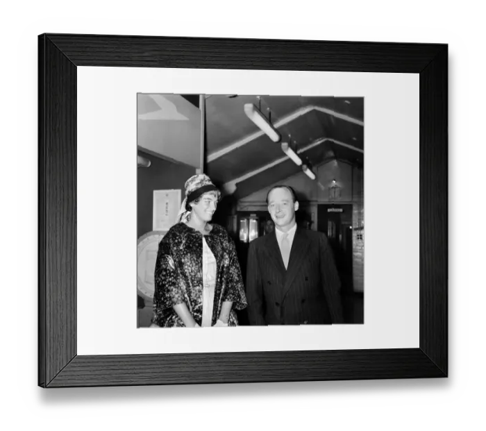 Framed Print : Racing driver and speed king Donald Campbell seen here with his wife at London Airport