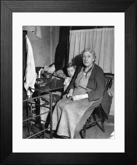 Framed Print : Grandmother and grandson. Circa 1938. Mrs. Shutt, 69, is one of Mr
