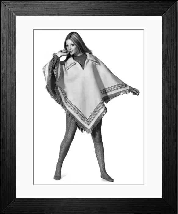 Framed Print : Reveille Fashions: Penny Dennis wearing a poncho. October 1969 P008474 Framed Print : Reveille Fashions: Penny Dennis wearing a poncho. October 1969 P008474