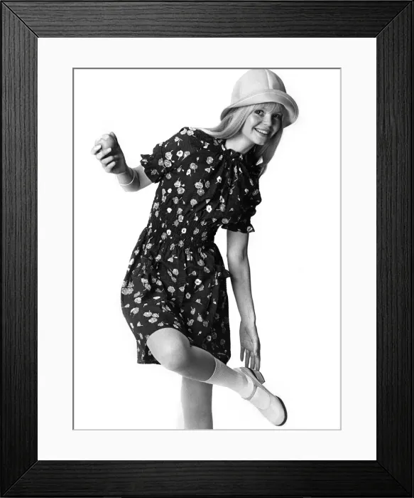Framed Print : Clothing: Pretty flower print on navy cotton dress with a shirred waistline