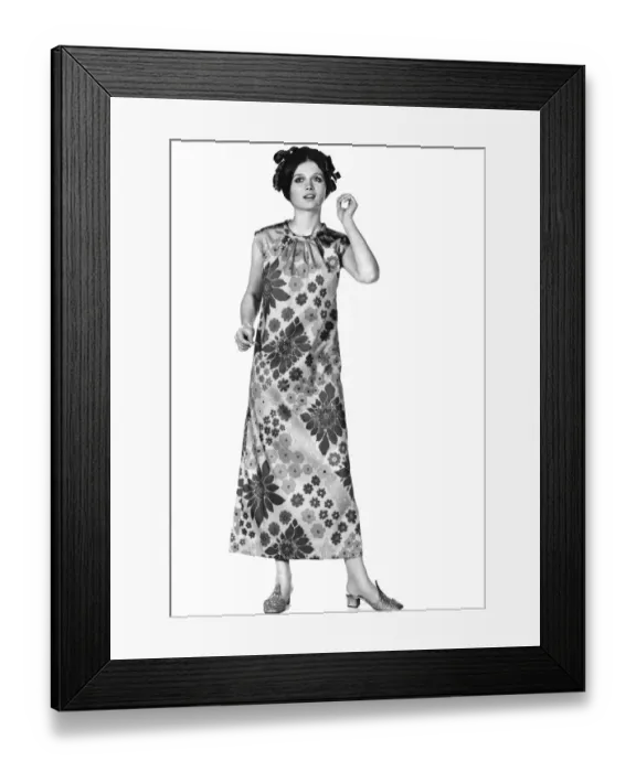 Framed Print : Reveille Fashions: Anabella Jones modelling full length dress. May 1969 P008469
