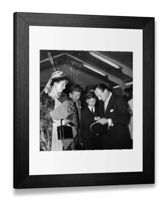 Framed Print : Racing driver and speed king Donald Campbell seen here with his wife at London Airport Framed Print : Racing driver and speed king Donald Campbell seen here with his wife at London Airport