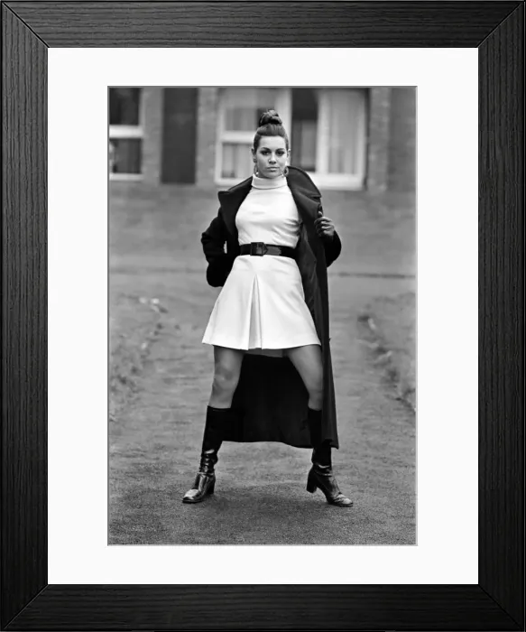 Framed Print : A model wearing the latest in fashions. April Royle wearing a midi (it doesn