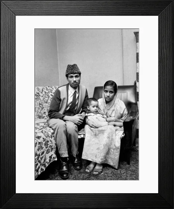Framed Print : An Asian family living in London. December 1969 Z12417-002 Framed Print : An Asian family living in London. December 1969 Z12417-002