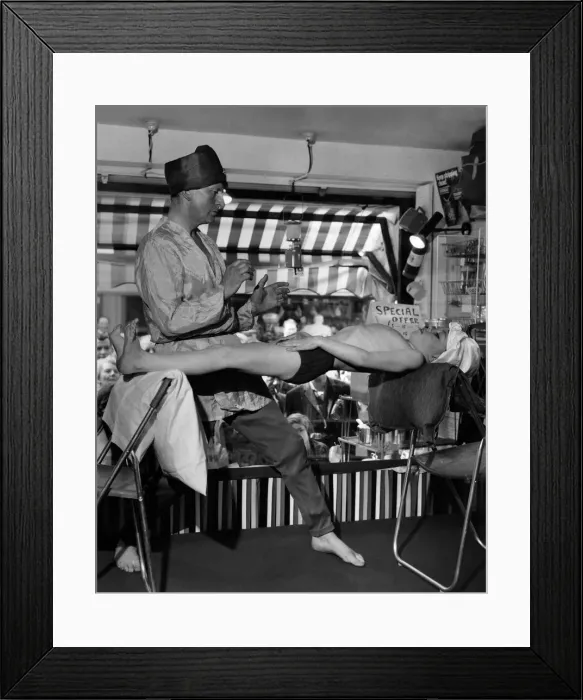 Framed Print : The Great Omanii'as Brighton stuntman Ron Cunningham likes to be called Framed Print : The Great Omanii'as Brighton stuntman Ron Cunningham likes to be called