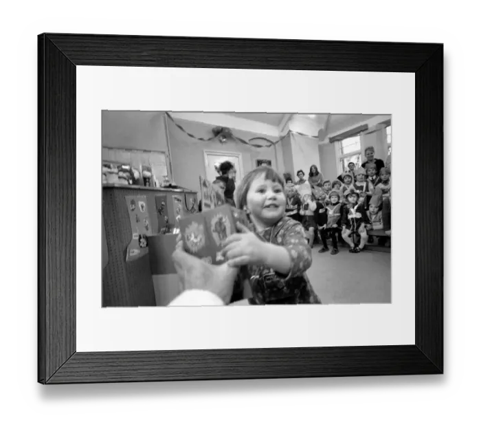 Framed Print : When Father Christmas is on duty handing out toys and gifts to children