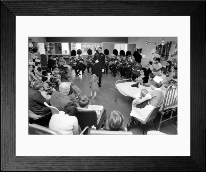 Framed Print : Part of the Coldstream Guards Band went to the childrens ward at St