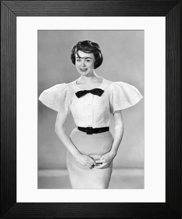 Framed Print : Model Jackie Jackson wearing blouse and skirt. June 1959 P006969