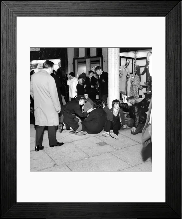 Framed Print : Ambulance men and medical workers attend to Beatles fans who were injured in a crush as Framed Print : Ambulance men and medical workers attend to Beatles fans who were injured in a crush as