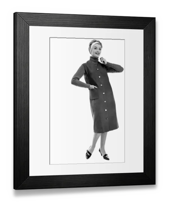 Framed Print : Mannequinn wearing a California casual worn with a high necked pullover Framed Print : Mannequinn wearing a California casual worn with a high necked pullover