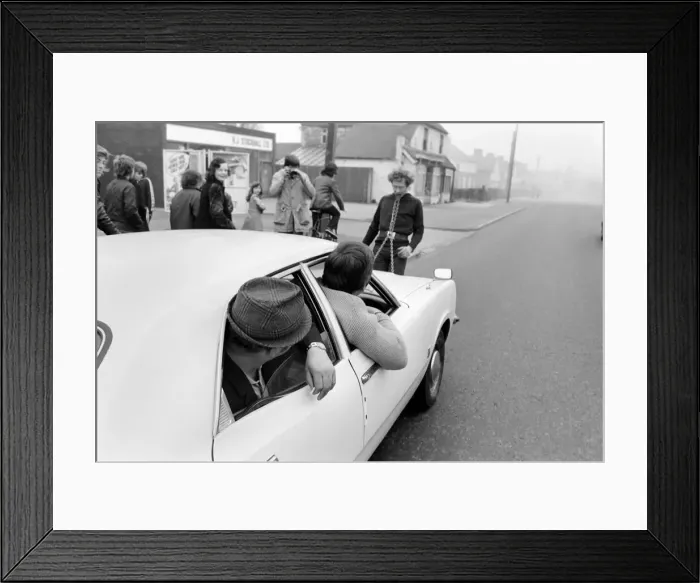 Framed Print : Strongman Reg Morris pulls car and passengers with his teeth. February 1975 75-00777-005 Framed Print : Strongman Reg Morris pulls car and passengers with his teeth. February 1975 75-00777-005