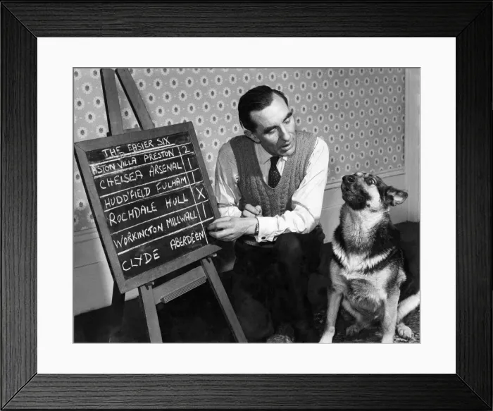 Framed Print : Bob Smith and Rita the Pools'dog. November 1958 P006442 Framed Print : Bob Smith and Rita the Pools'dog. November 1958 P006442
