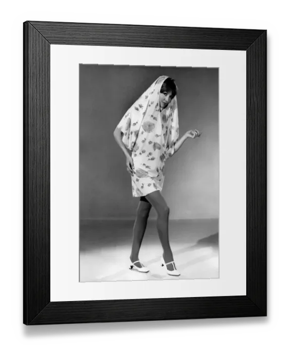 Framed Print : Reveille Fashions 1966: Anne Powell modelling summer dress come shower coat