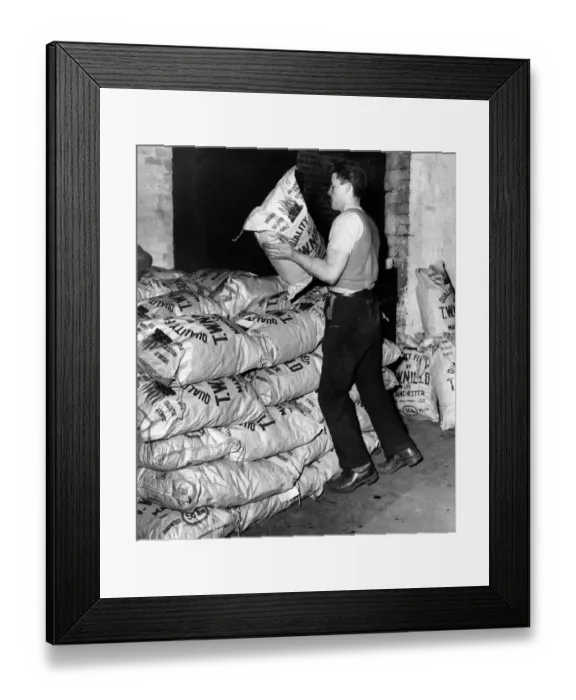Framed Print : Coal in paper bags. After the filling and sealing of the paper bags of coal - each Framed Print : Coal in paper bags. After the filling and sealing of the paper bags of coal - each