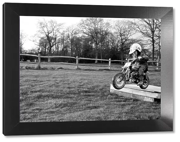 4 years old Jan Dixon on his mino motor bike. December 1974 74-7664-004