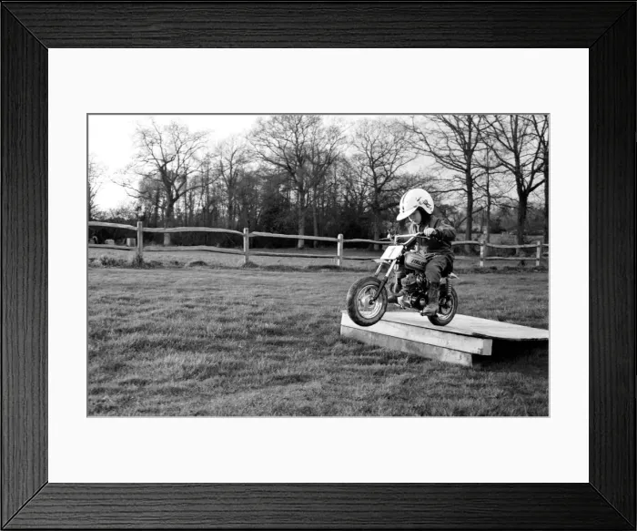 Framed Print : 4 years old Jan Dixon on his mino motor bike. December 1974 74-7664-004 Framed Print : 4 years old Jan Dixon on his mino motor bike. December 1974 74-7664-004