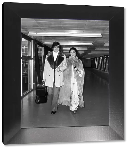 Elizabeth Taylor with Henry Wynberg seen here arriving at Heathrow Airport
