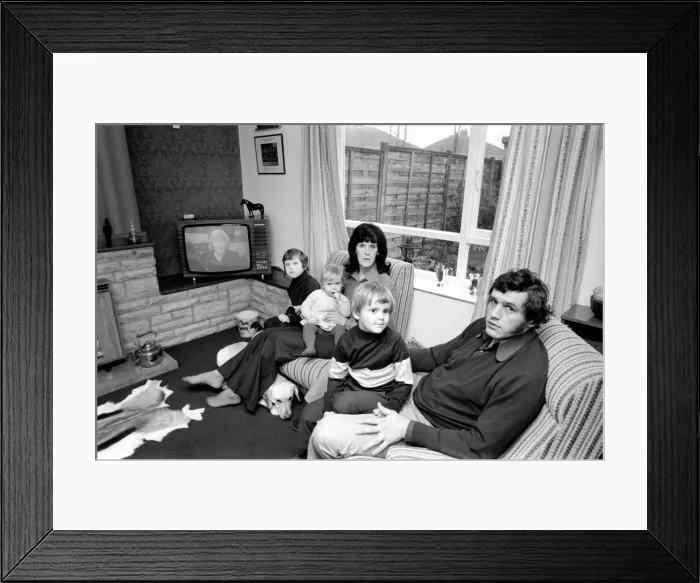 Framed Print : Gloucester prop Mike Burton with wife Pat and children. January 1975 75-00341-001 Framed Print : Gloucester prop Mike Burton with wife Pat and children. January 1975 75-00341-001