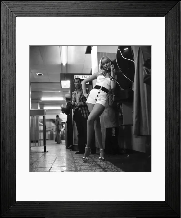 Framed Print : Model Christine Donna seen here using the public telephones at Holborn tube station Framed Print : Model Christine Donna seen here using the public telephones at Holborn tube station