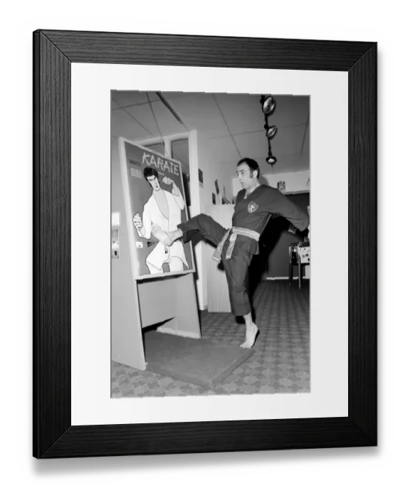 Framed Print : Karate Machine: Man / Machine / Unusual / Humour: Kung Fu man Baron Omidi tries out the new Framed Print : Karate Machine: Man / Machine / Unusual / Humour: Kung Fu man Baron Omidi tries out the new