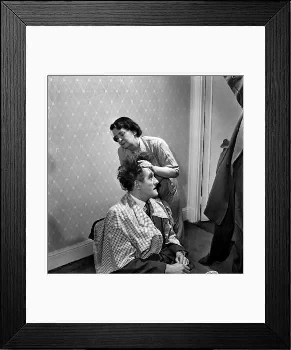 Framed Print : Hair restoration expert seen here giving a consultation. D7584 Framed Print : Hair restoration expert seen here giving a consultation. D7584