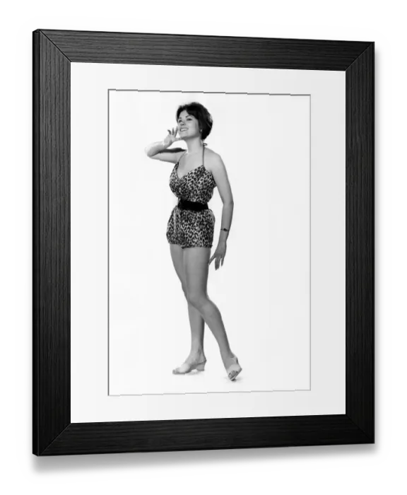 Framed Print : Reveille fashions: Wendy Richard modelling animal print swimming costume