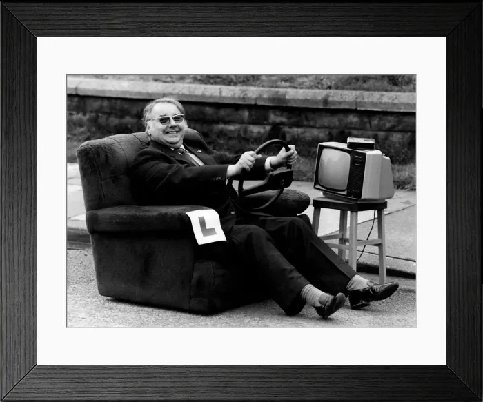 Framed Print : Unusual 1983: Sales Drive. Director Alan Fleet at the wheel. August 1983 P009429
