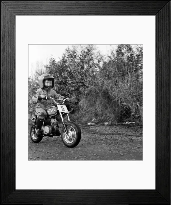 Framed Print : Child / Boy / Motorbike: Garry Jess, 3, ride minibike. January 1975 75-00555 Framed Print : Child / Boy / Motorbike: Garry Jess, 3, ride minibike. January 1975 75-00555