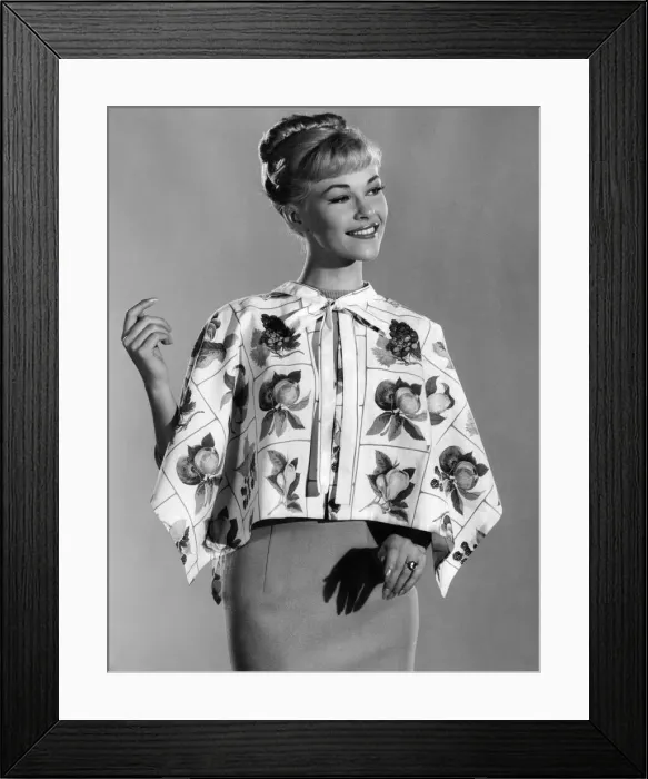 Framed Print : Reveille fashions 1961: Jo Waring wearing a floral print blouse. December 1961 P008817