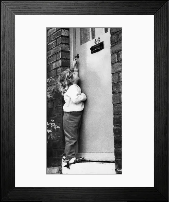 Framed Print : Just big enough for the key-hole, but not old enough to be left alone at home - A young Framed Print : Just big enough for the key-hole, but not old enough to be left alone at home - A young