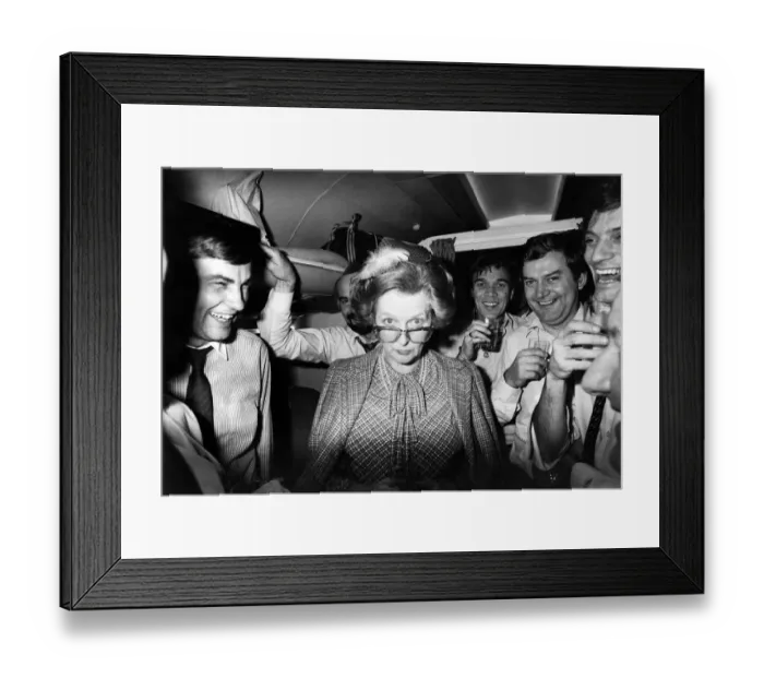 Framed Print : Prime Minister Margaret Thatcher seen here with Journalist on her plane returning to