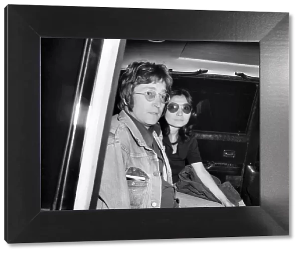 John Lennon and Yoko Ono on arrival at London Airport after returning from Majorca
