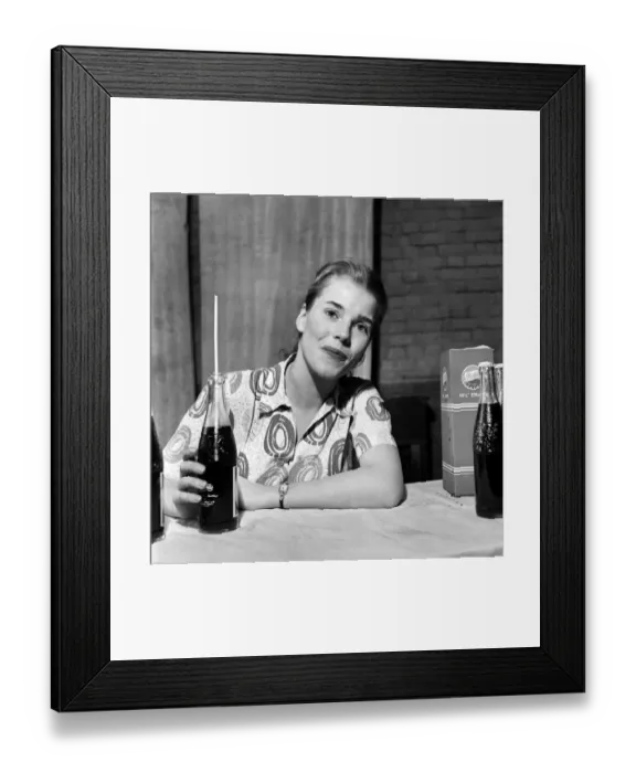 Framed Print : Television Presenters: Joan Aubrey and Bernard Lee seen here enjoying a Pepsi Cola Framed Print : Television Presenters: Joan Aubrey and Bernard Lee seen here enjoying a Pepsi Cola
