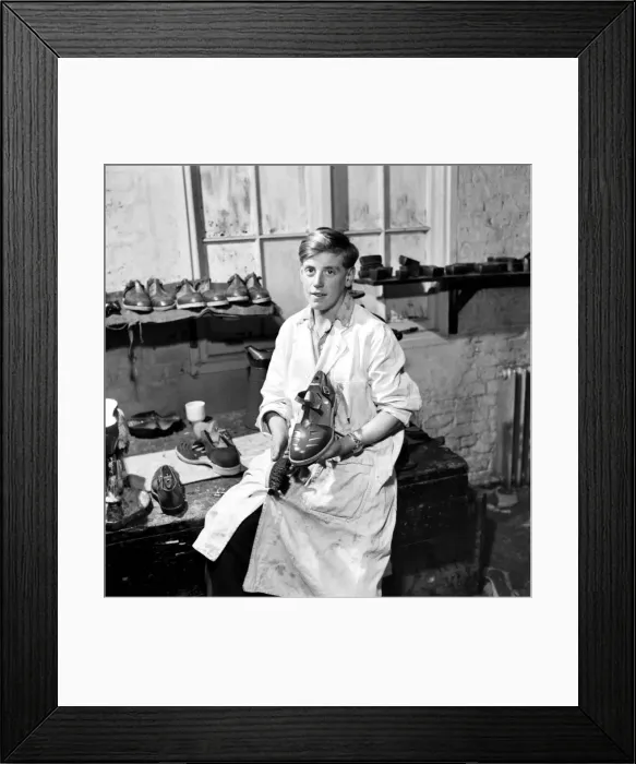 Framed Print : Orphan boy training to be a cobbler. December 1953 D7472A Framed Print : Orphan boy training to be a cobbler. December 1953 D7472A