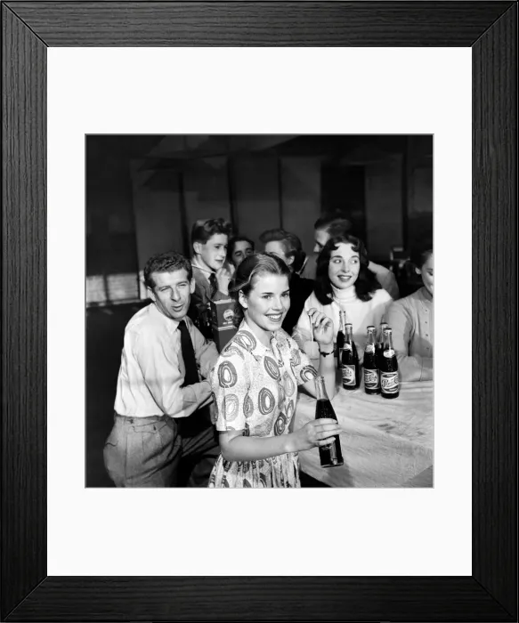 Framed Print : Television Presenters: Joan Aubrey and Bernard Lee seen here enjoying a Pepsi Cola Framed Print : Television Presenters: Joan Aubrey and Bernard Lee seen here enjoying a Pepsi Cola