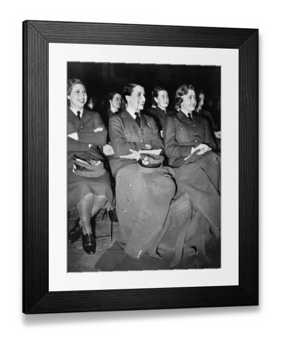 Framed Print : World War II: Women. Girl officer in W. A. F. S. with monocle at R. A. F Framed Print : World War II: Women. Girl officer in W. A. F. S. with monocle at R. A. F