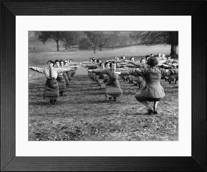 Framed Print : World War II. Women. Keep fit. The knees double bend is not so easy, as it appears Framed Print : World War II. Women. Keep fit. The knees double bend is not so easy, as it appears
