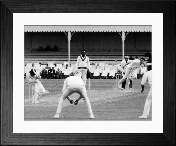 Framed Print : Eifion Jones takes swift avoiding action and this ball, from the airborne Sussex bowler Framed Print : Eifion Jones takes swift avoiding action and this ball, from the airborne Sussex bowler