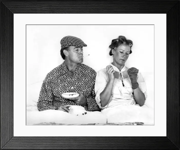Framed Print : The British at bed time. Husband and wife similar to Andy Capp and Flo seen here in bed Framed Print : The British at bed time. Husband and wife similar to Andy Capp and Flo seen here in bed