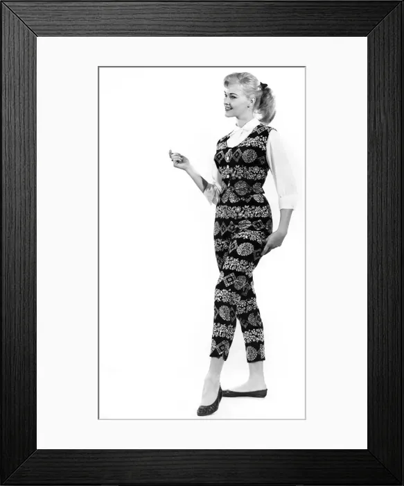 Framed Print : Reveille fashions: Jo Waring wearing a matching patterned slacks and top Framed Print : Reveille fashions: Jo Waring wearing a matching patterned slacks and top