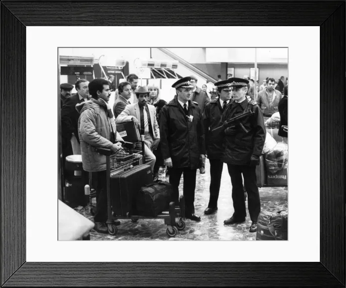 Framed Print : Gun-Row Heathrow: This was the menacing scene which greeting travellers at Heathrow Framed Print : Gun-Row Heathrow: This was the menacing scene which greeting travellers at Heathrow